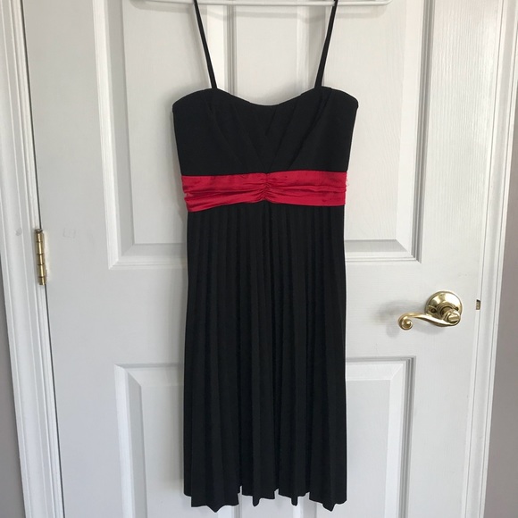 black dress with red ribbon